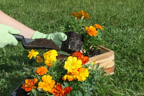 Eco-friendly landscaping crew managing recycling and waste separation